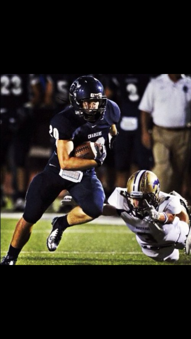 Austin Humphrey #20 breaking a tackle for Boerne Champion Chargers